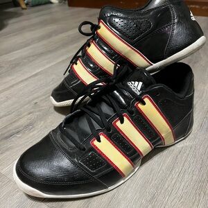 Adidas Black and Yellow Sneakers with Signature Stripes